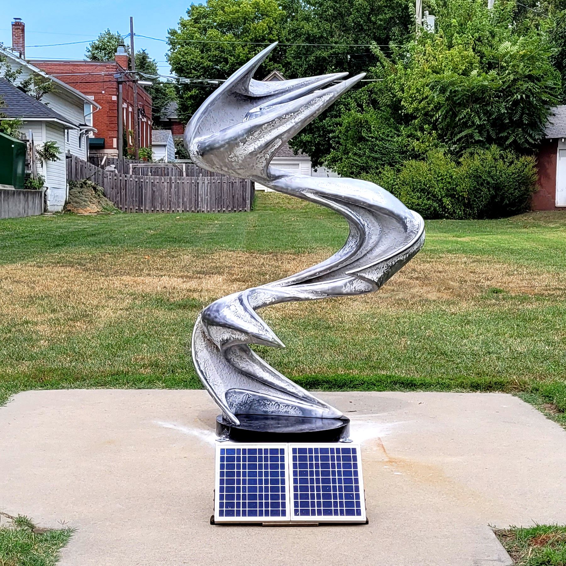 Photo of a sculpture called Equal and Opposite made of aluminum