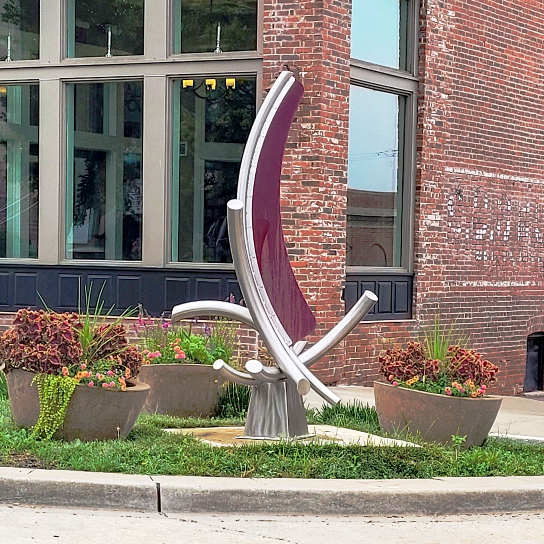 Photo of a sculpture named \"Spider\" on the corner of Kansas and Main Streets